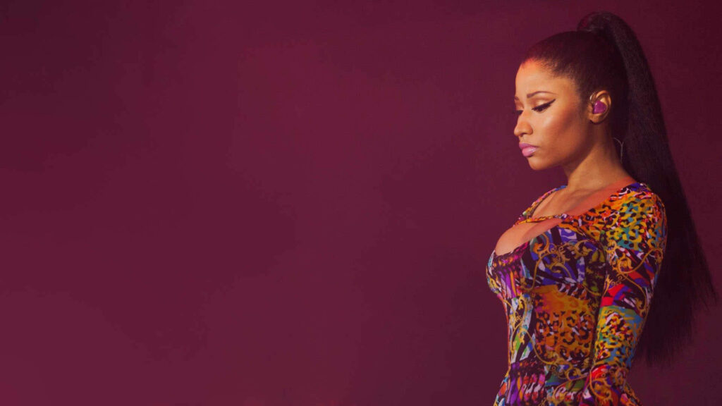 Colorful Nicki Minaj Wallpaper: Bold Style on Maroon Background