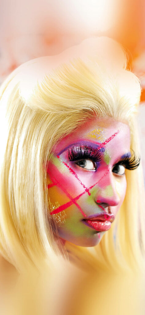 Vibrant Nicki Minaj Wallpaper: Bold Face Paint & Iconic Style