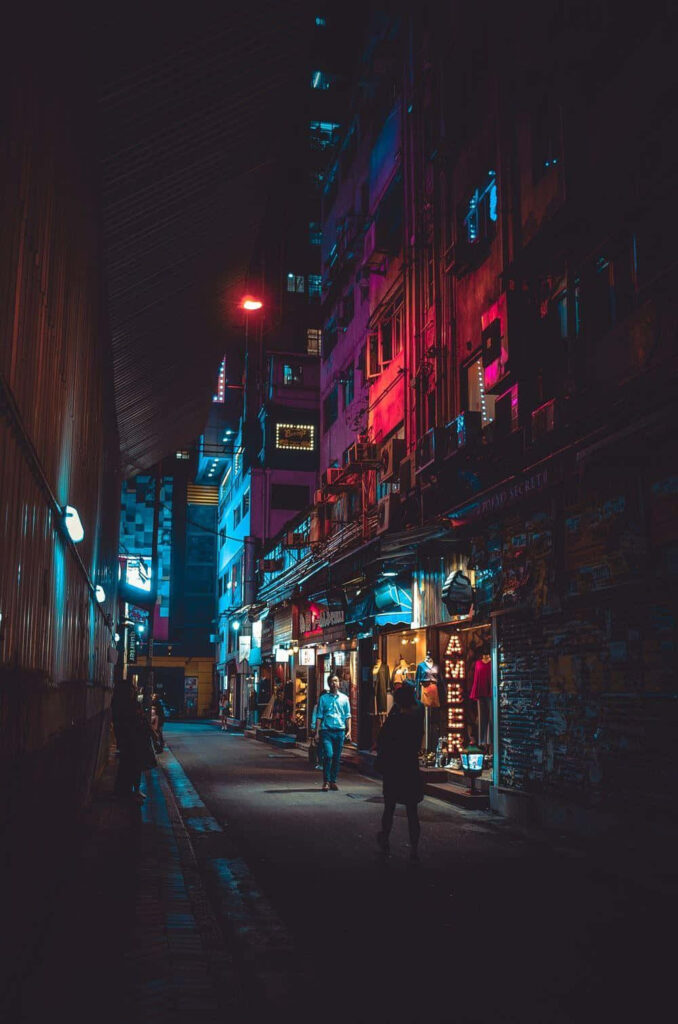 Vibrant Night Alley Wallpaper: Neon Lights & Urban Atmosphere