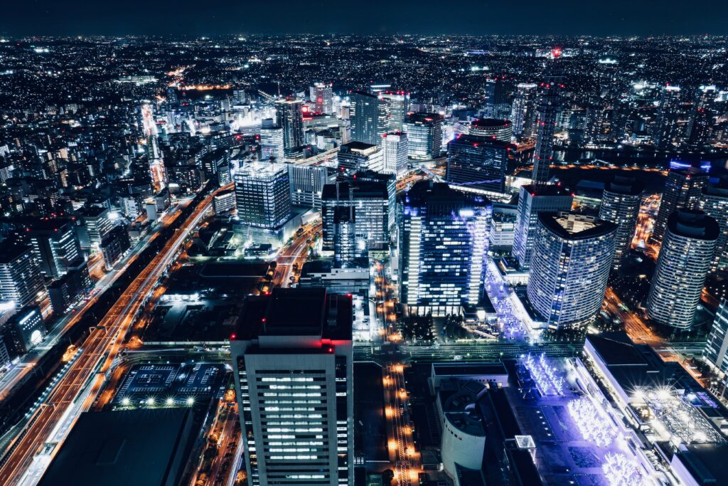 Vibrant Night City Wallpaper: Aerial View of Illuminated Metropolis