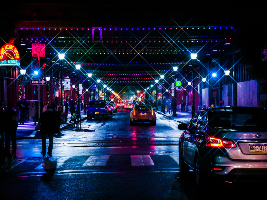 Vibrant Night City Street Wallpaper: Colorful Lights & Urban Ambiance