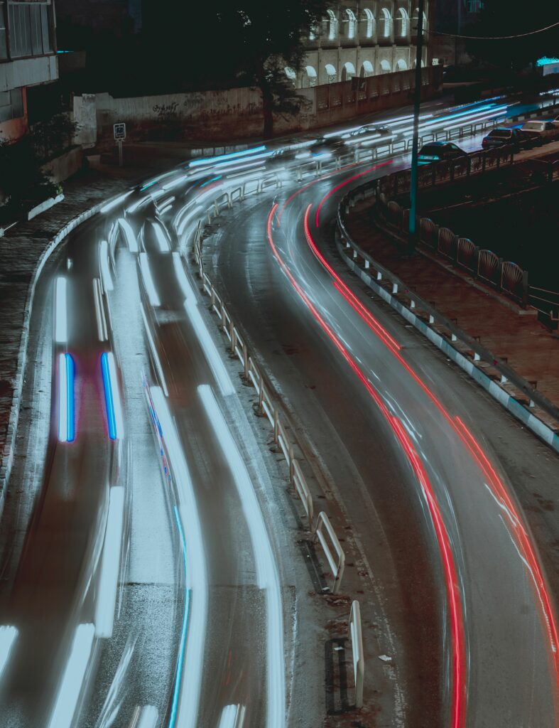 Vibrant Night Road Long-Exposure Wallpaper: Dynamic Urban Trails
