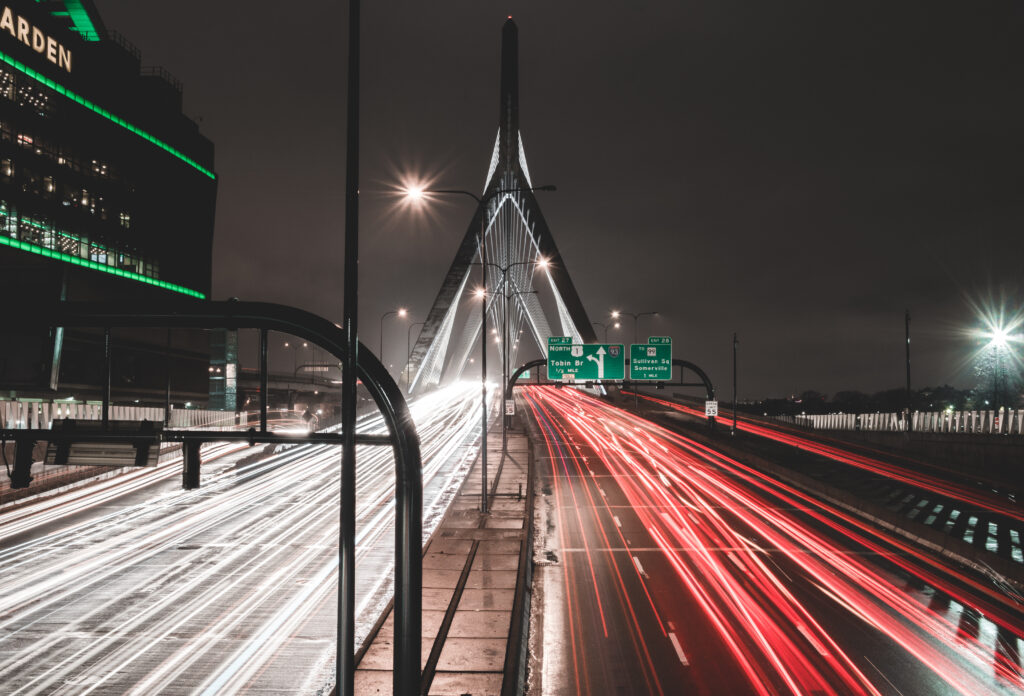 Vibrant Urban Bridge Wallpaper: Night Scene with Car Light Streaks