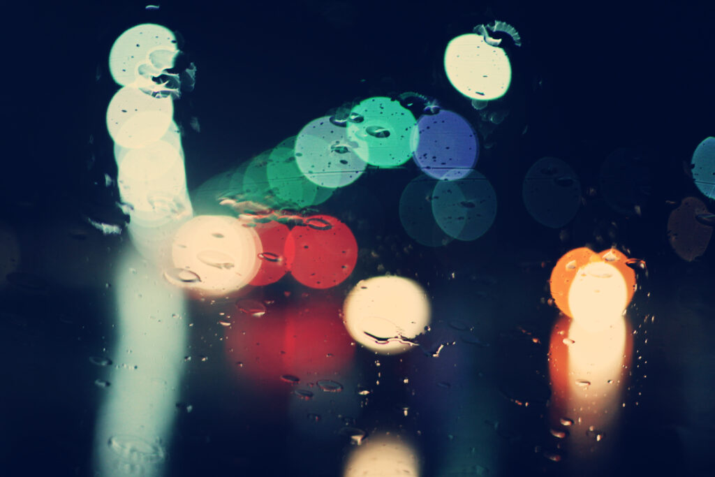 Vibrant Night Scene Wallpaper with Colorful Bokeh & Raindrops