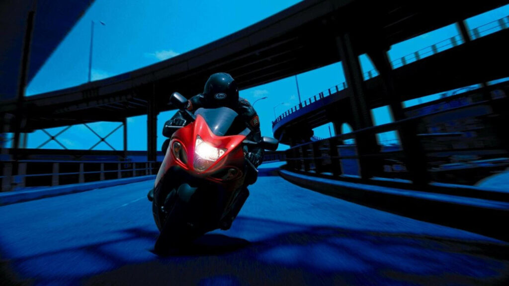 Dynamic Night Motorcycle Ride Wallpaper: Thrill & Adventure