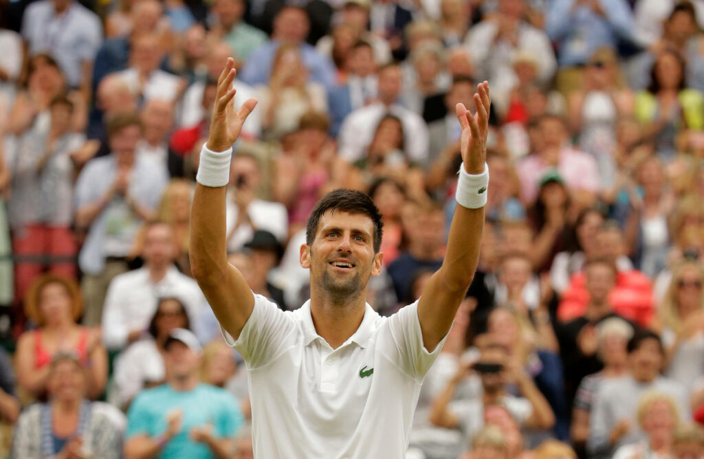 Novak Djokovic Wimbledon 2021 Victory Wallpaper - Celebratory Background