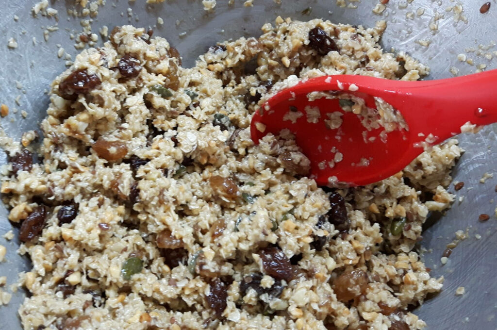 Vibrant Oatmeal Raisin Batter Close-Up: Texture & Ingredients Wallpaper