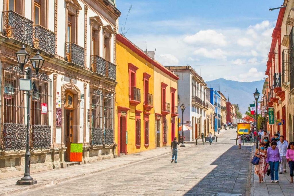 Vibrant Oaxaca Wallpaper: Colorful Streets & Scenic Mountain View