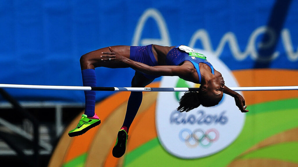 Vibrant Olympic High Jump Wallpaper: Strength & Skill at Rio 2016