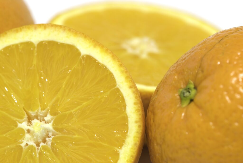 Vibrant Orange Citrus Fruits Wallpaper Background - Fresh & Juicy