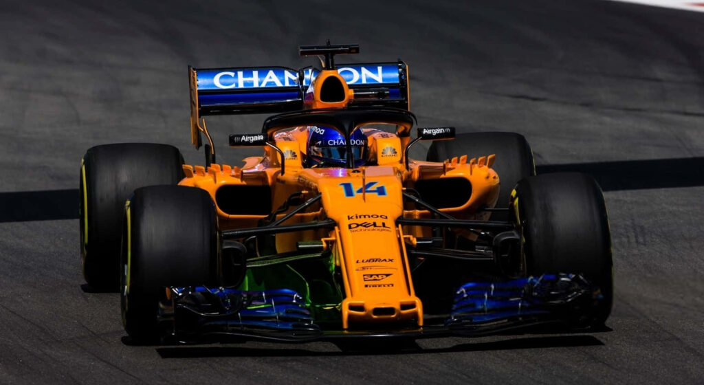 Vibrant Formula 1 Car Wallpaper: Speed & Performance in Action