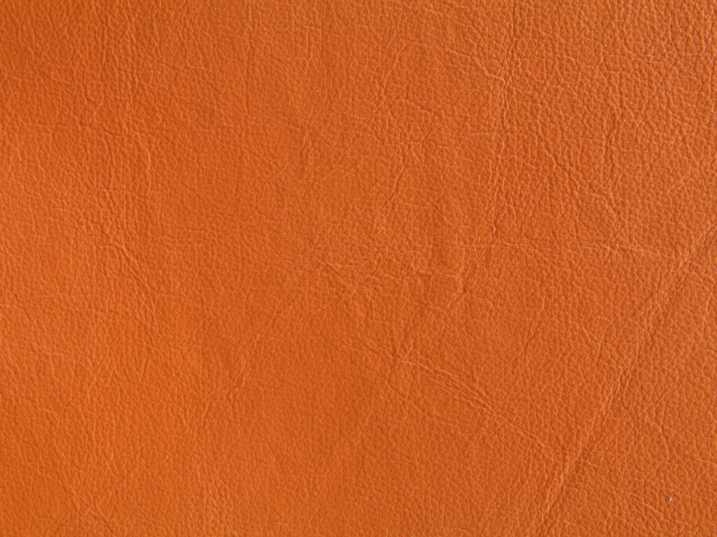 Vibrant Orange Leather Texture Wallpaper Background - Stylish Finish