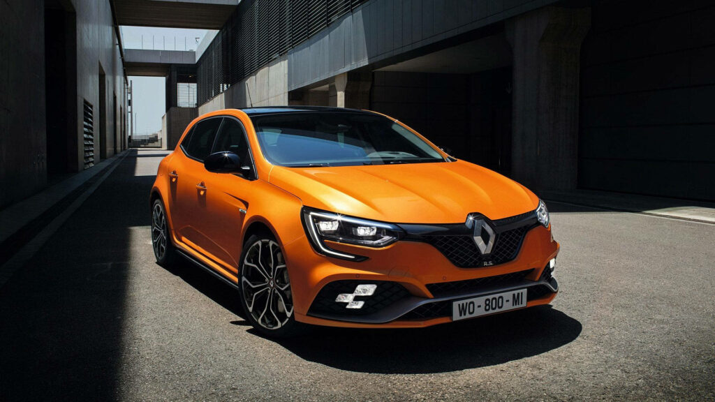 Vibrant Orange Renault Megane Wallpaper - Sleek Urban Design