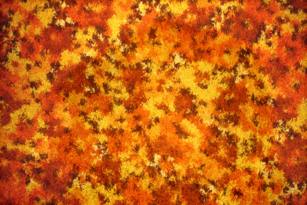 Vibrant Orange and Yellow Carpet Texture Wallpaper Background