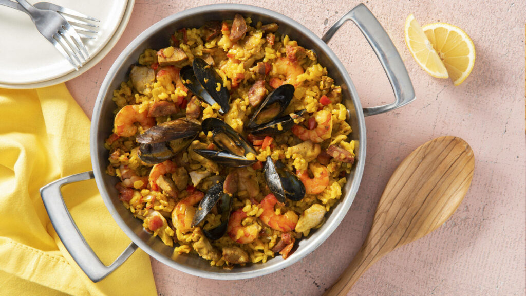 Vibrant Paella: Saffron Rice with Mussels & Shrimp - Rustic Wallpaper
