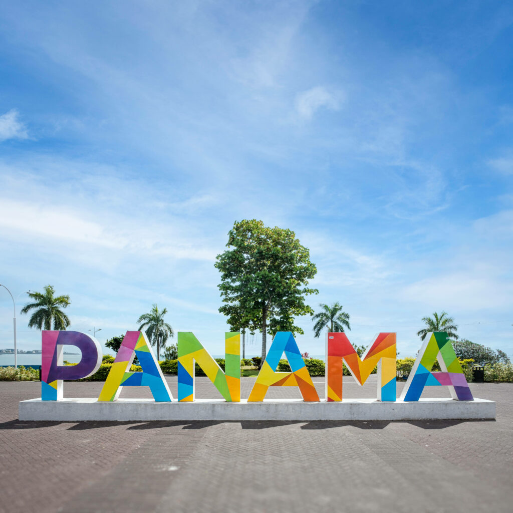 Vibrant Panama Sign Wallpaper: Tropical Ambiance with Clear Sky