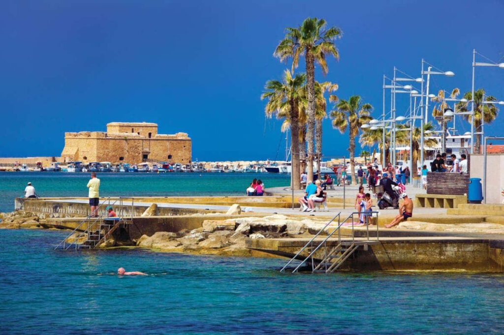 Vibrant Paphos Seaside Wallpaper: Fort, Palm Trees & Coastal Vibes