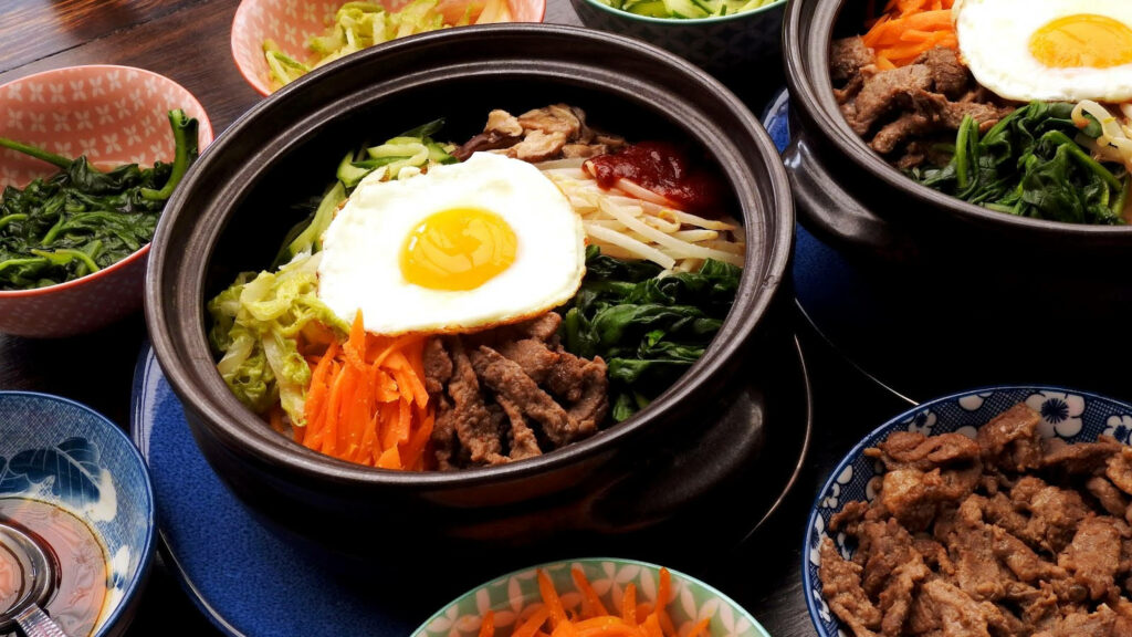 Vibrant Party Bibimbap Bowls: Colorful Wallpaper Background