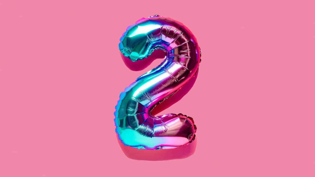 Vibrant Pink Party Wallpaper: Metallic Number 2 Balloon Design