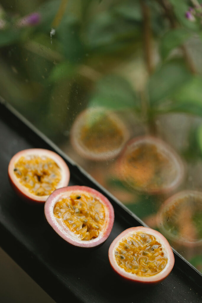 Vivid Passion Fruit Wallpaper: Close-Up with Bright Yellow Pulp