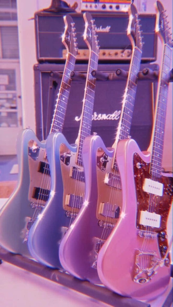 Pastel Electric Guitars Wallpaper with Marshall Amplifier Aesthetic