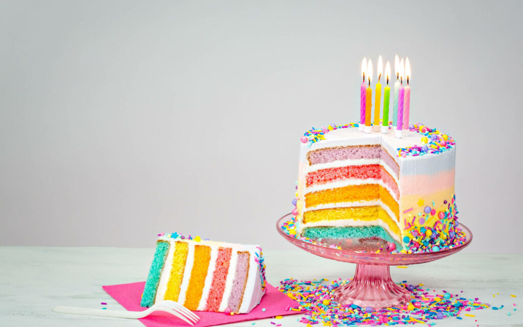 Vibrant Pastel Layer Cake Wallpaper with Colorful Candles & Confetti