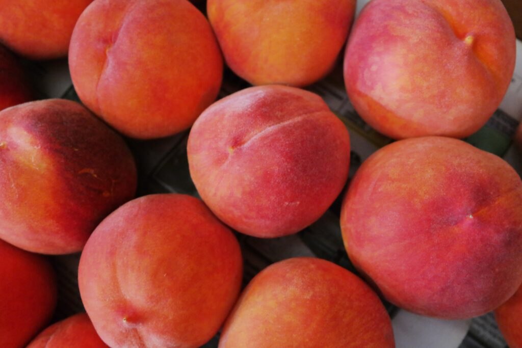 Vibrant Peach Wallpaper: Fresh Ripe Peaches in Stunning Colors