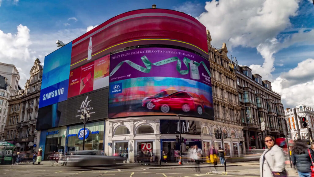 Dynamic Piccadilly Circus Wallpaper: Vibrant Urban Life & Motion Blur