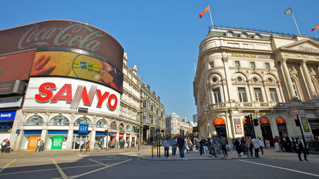 Vibrant Piccadilly Circus Wallpaper: Iconic Ads & Lively Atmosphere