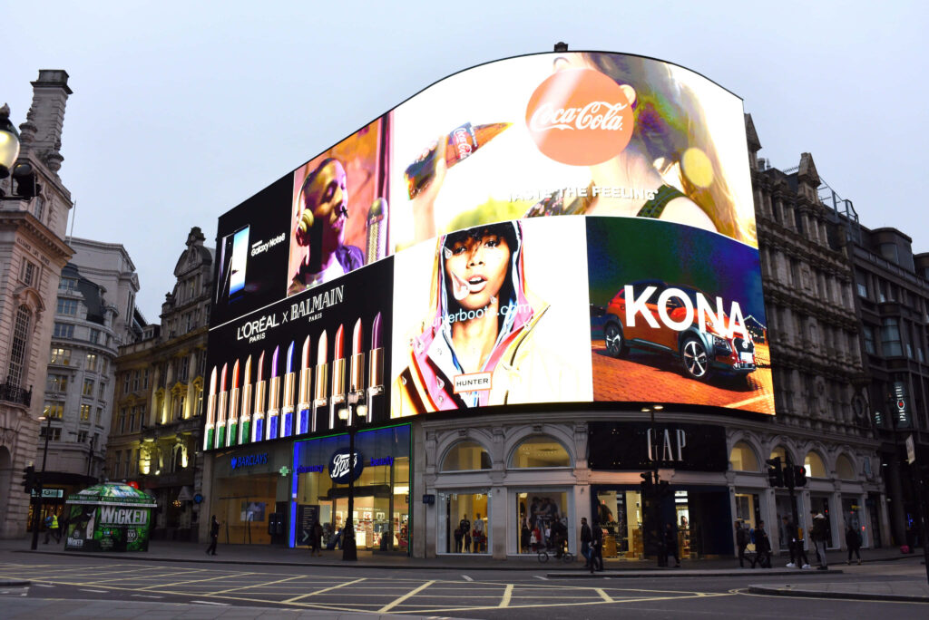 Vibrant Piccadilly Circus LED Wallpaper: Colorful Urban Advertisements