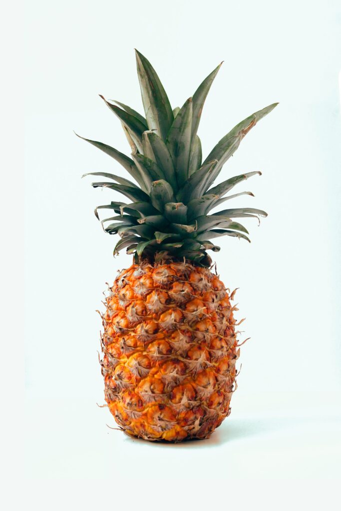 Vibrant Pineapple Minimalist Wallpaper - Tropical Essence Design