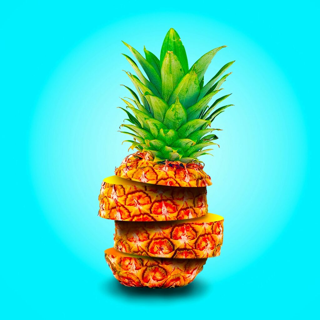 Exotic Pineapple Wallpaper: Tropical Vibes on Bright Blue Background