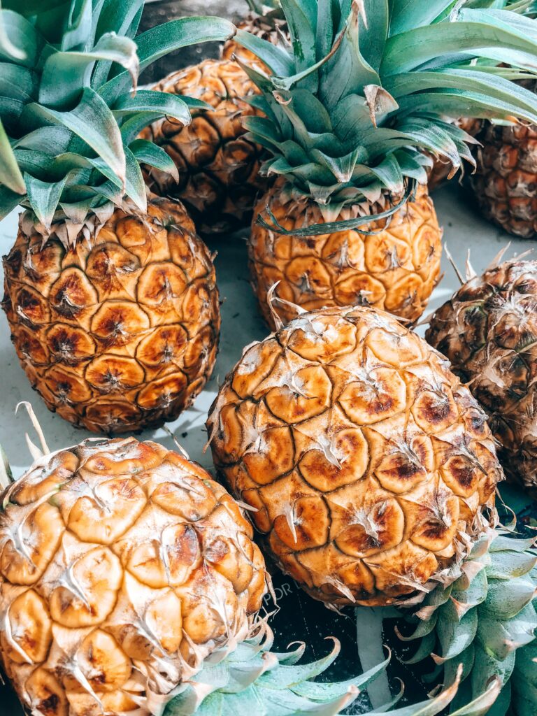 Vibrant Pineapple Wallpaper: Fresh Fruits with Textured Golden Skins