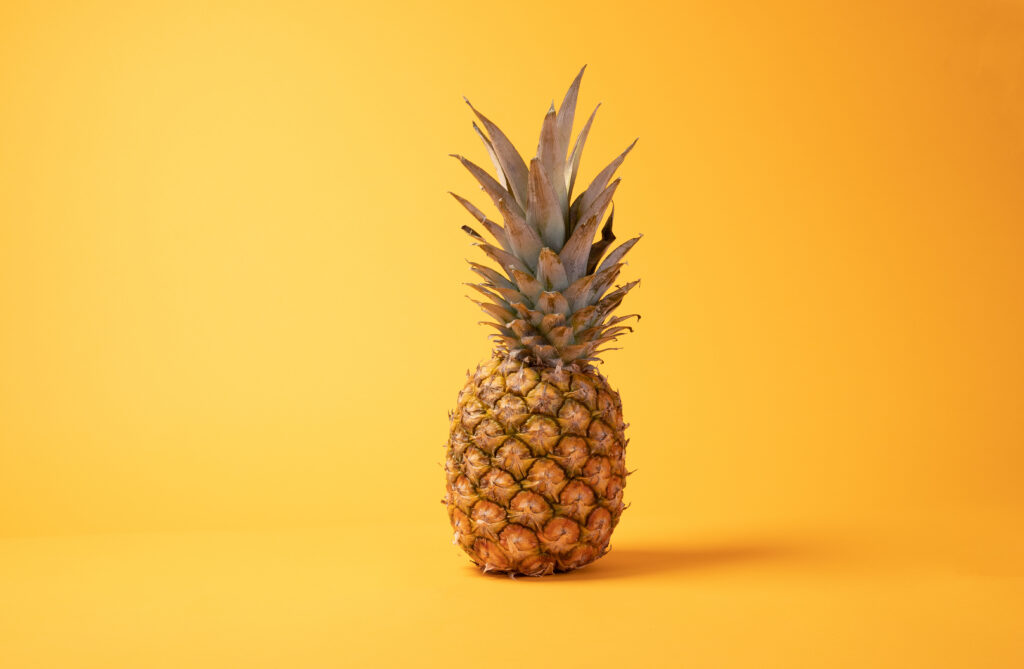 Vibrant Pineapple Wallpaper: Fresh Tropical Style on Bold Yellow