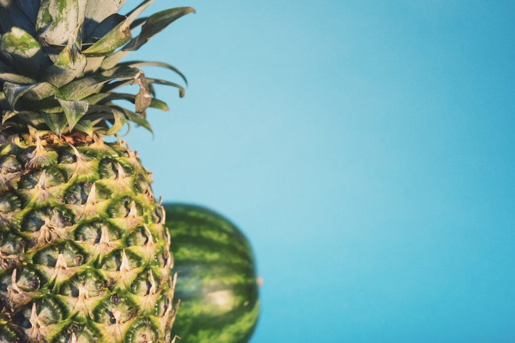 Vibrant Pineapple & Watermelon Wallpaper Background on Blue