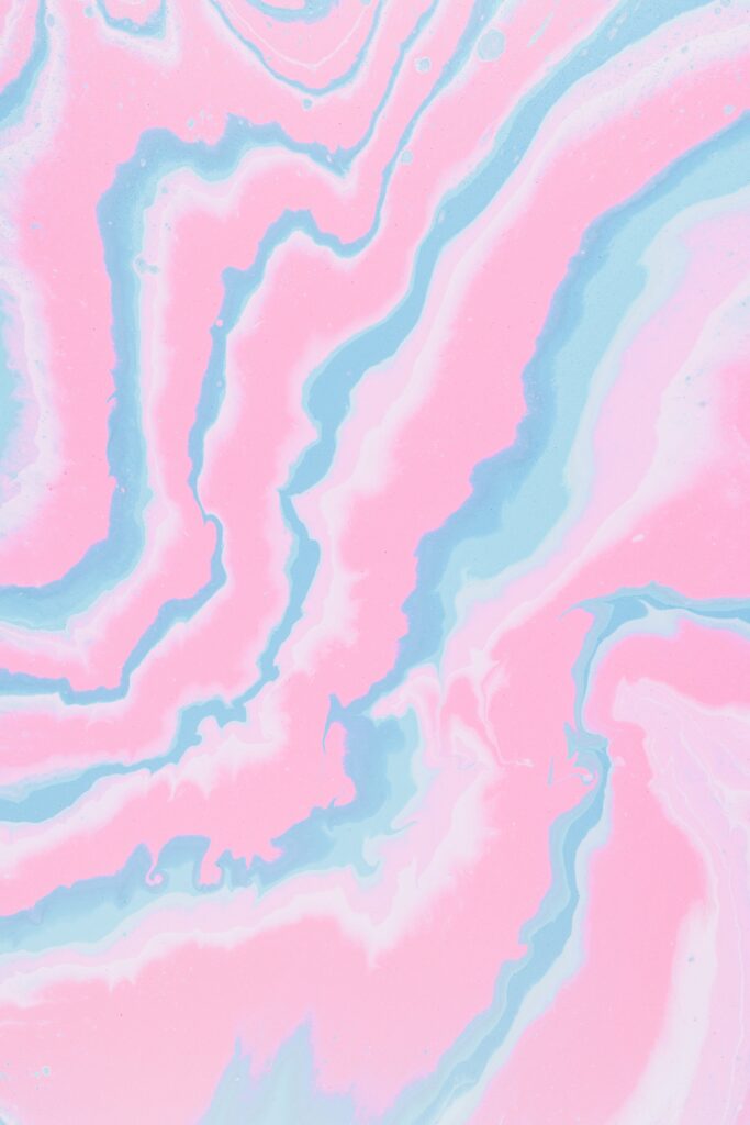 Vibrant Pink and Blue Abstract Wallpaper: Mesmerizing Marbled Background