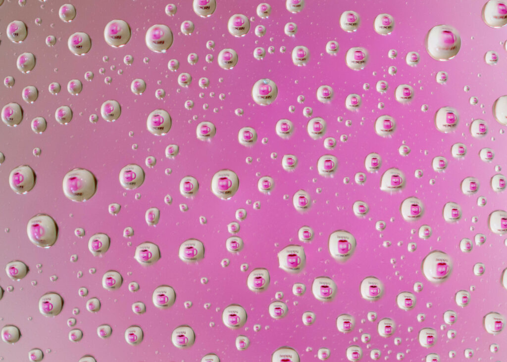 Vibrant Pink Bubble Wallpaper with Intricate Reflections