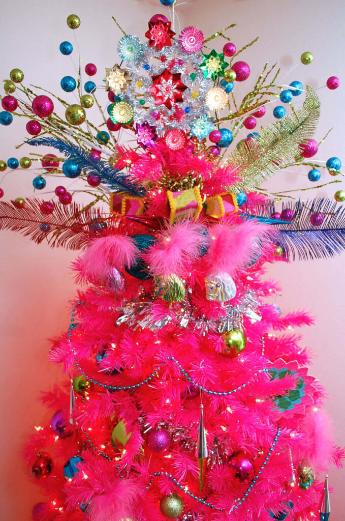 Cheerful Pink Christmas Tree Wallpaper - Vibrant Holiday Background