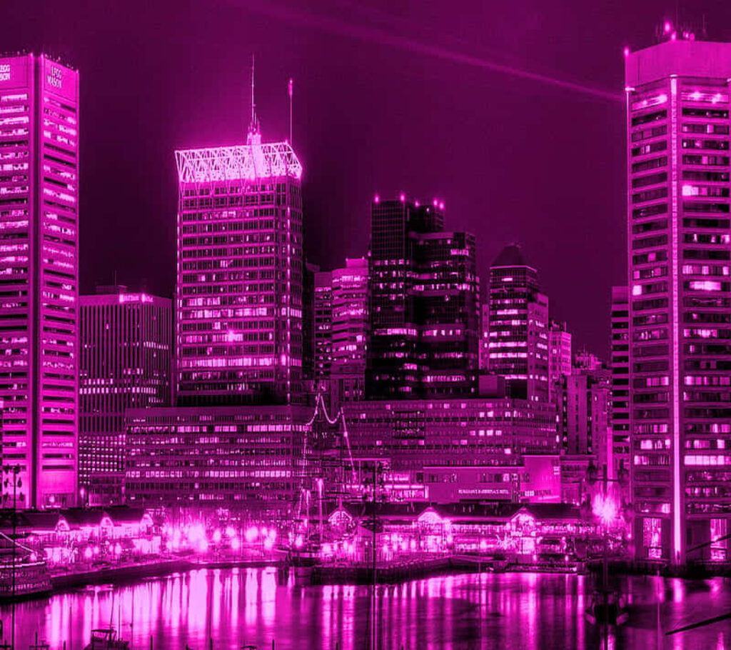 Vibrant Pink City Skyline Wallpaper: Stunning Reflections at Night