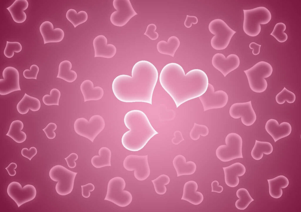 Vibrant Pink Heart Wallpaper Background for a Cheerful Ambiance