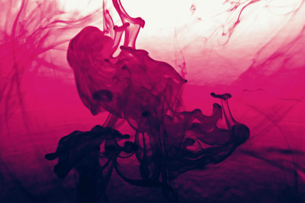 Vibrant Pink Liquid Drops Wallpaper: Abstract Art Background