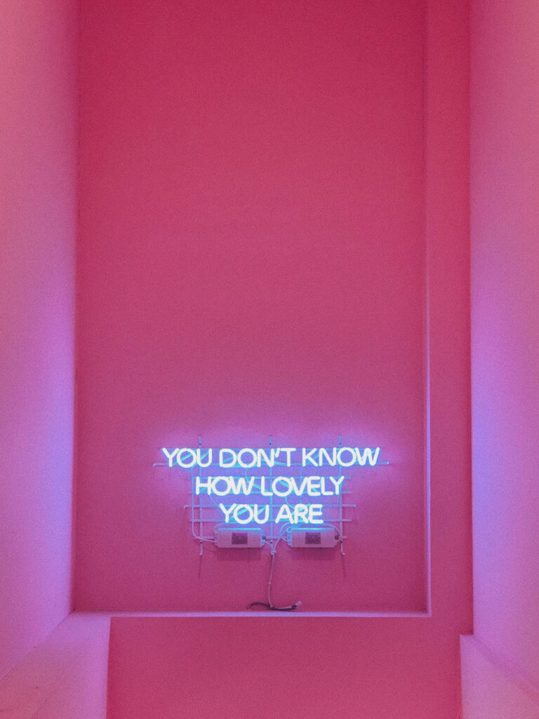 Vibrant Pink Neon Quote Wallpaper: Uplifting Aesthetic Background