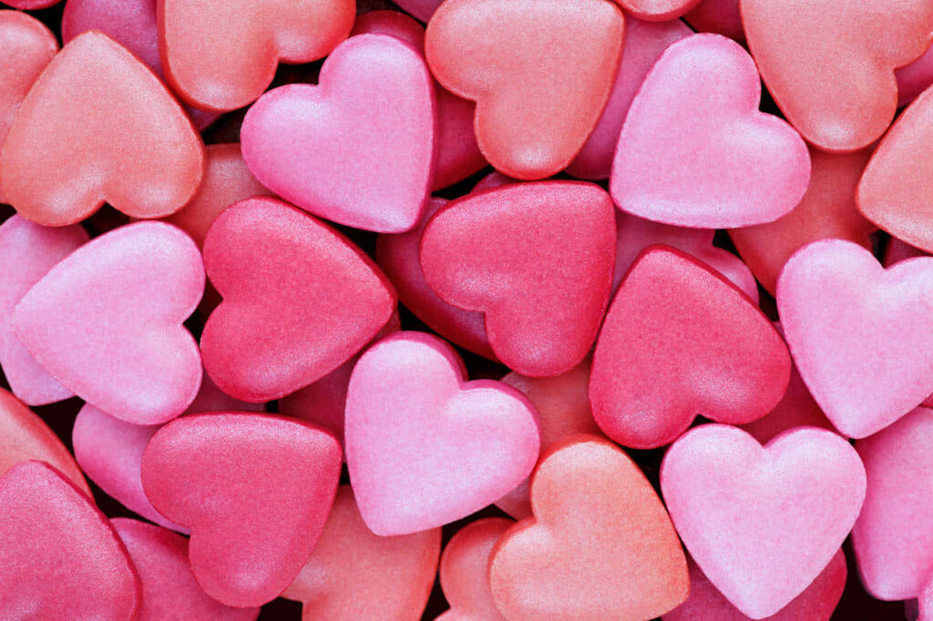 Vibrant Pink & Red Heart Shapes Wallpaper Background for Romance