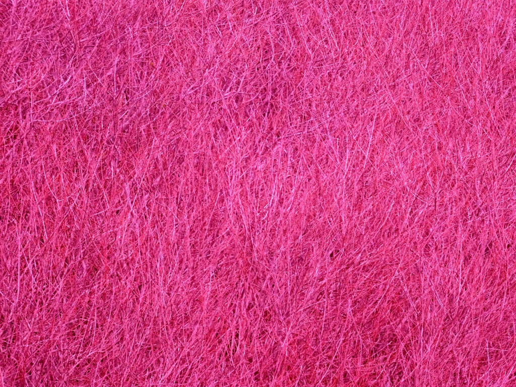 Vibrant Pink Textured Wallpaper with Intricate Fine Lines Design