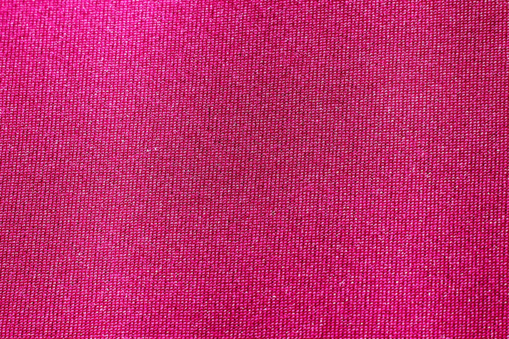 Elegant Pink Velvet Silk Wallpaper Background: Luxurious Fabric Texture