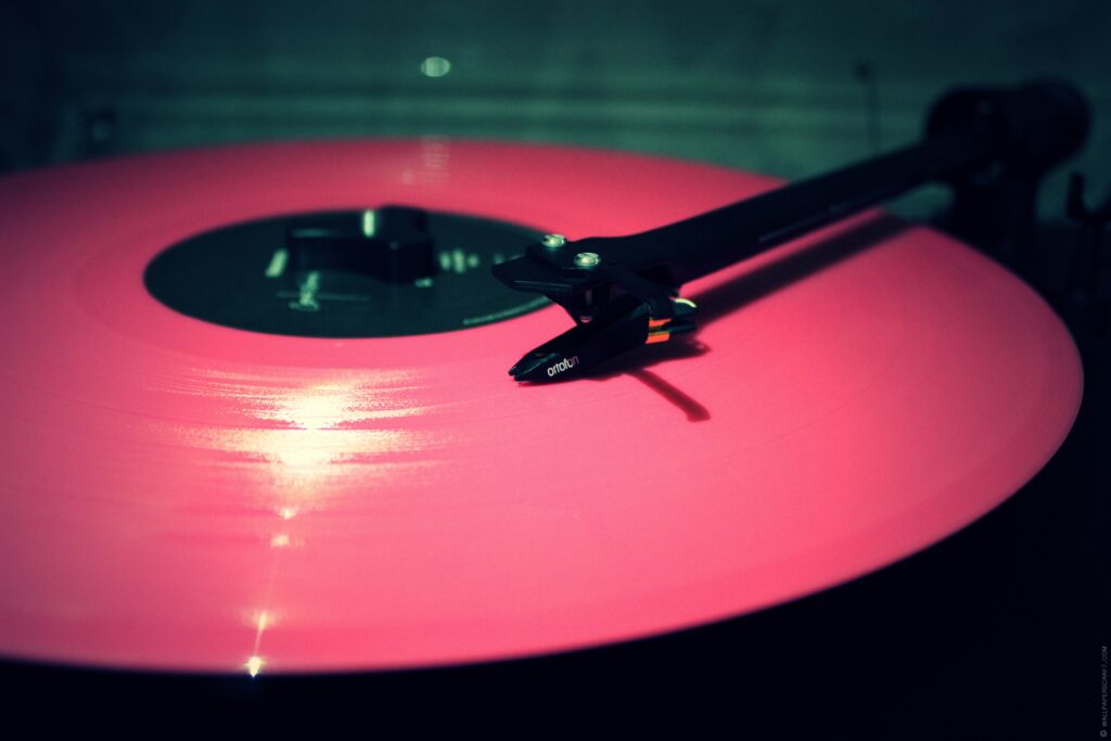Vibrant Pink Vinyl Record Turntable Wallpaper Background