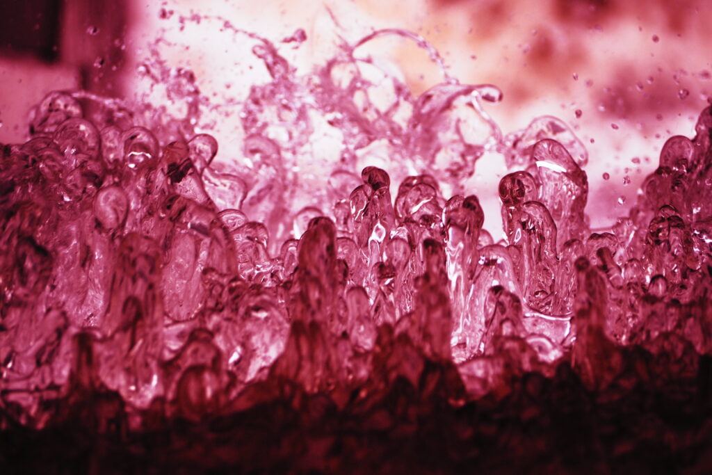 Vibrant Pink Macro Water Splashes - Stunning Fountain Wallpaper
