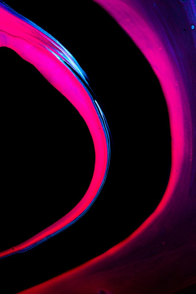 Vibrant Pink & Blue Abstract Wallpaper on Black Background