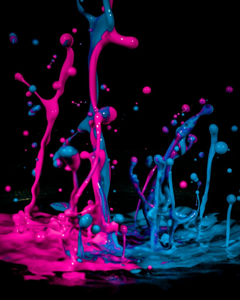Dynamic Pink & Blue Ink Splash Macro Wallpaper Background