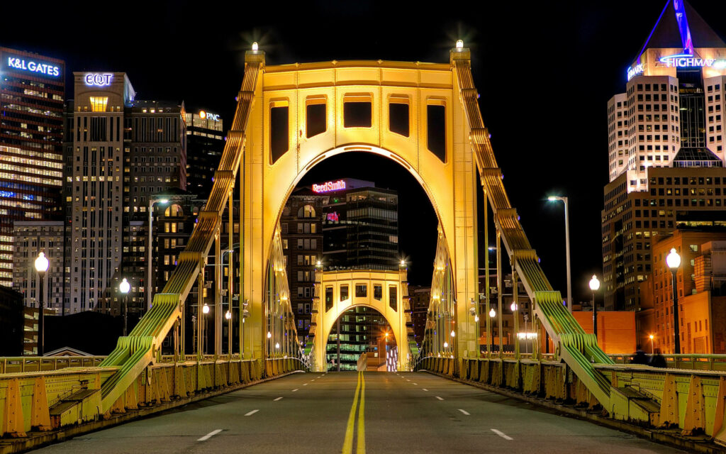 Vibrant Pittsburgh Night View: Yellow-Green Bridge & Skyline Wallpaper